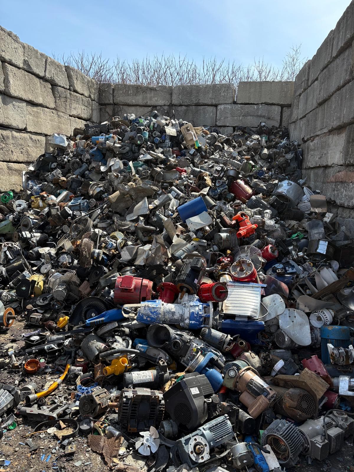 Mixed ferrous and non-ferrous scrap pile at Allied Metal Trading